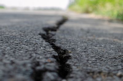 Repairs uneven surfaces, reducing the risk of tripping or vehicle damage